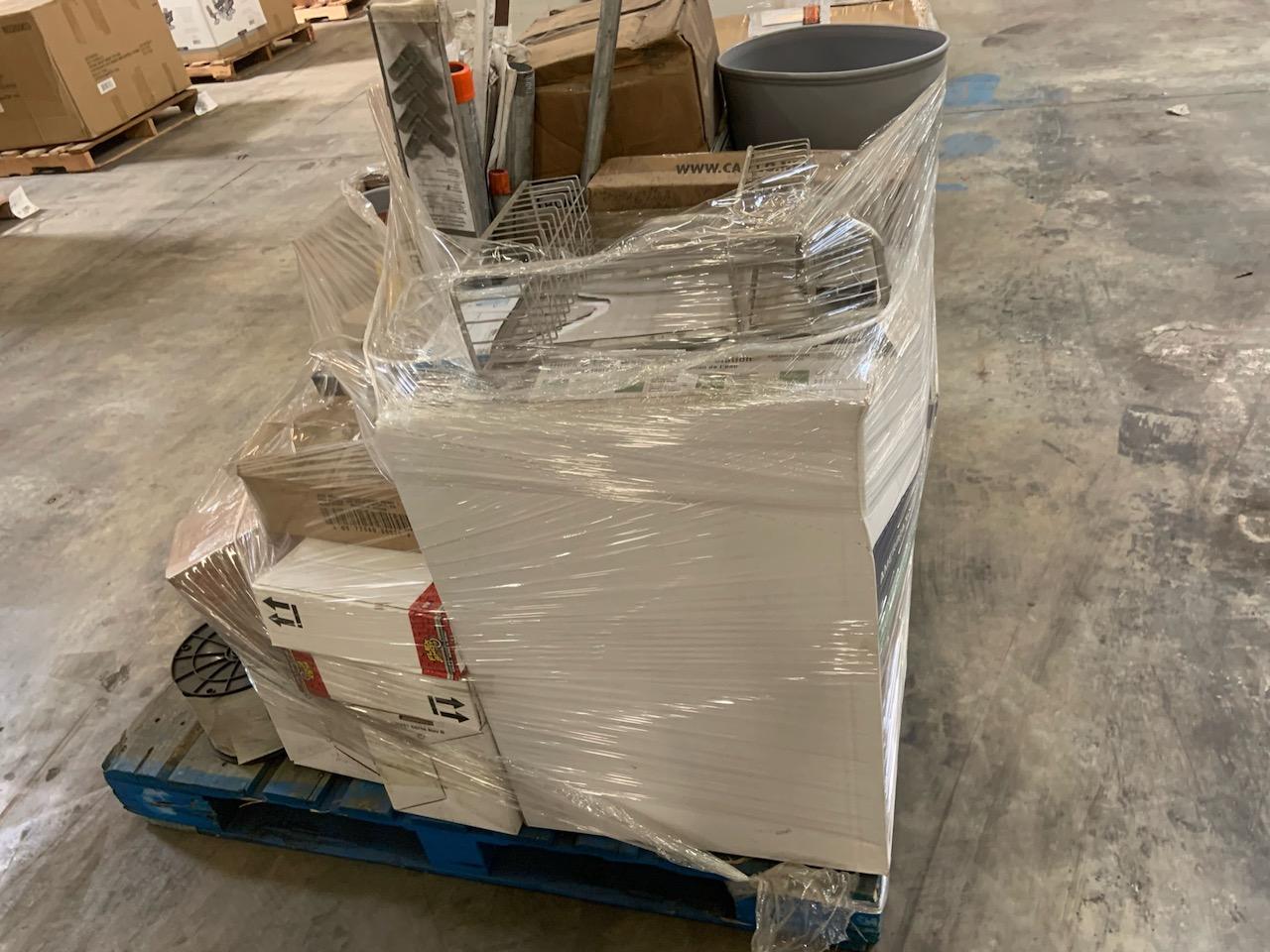Pallet of mixed merchandise, to include but not limited to: downspout extension, toaster, slow cooke