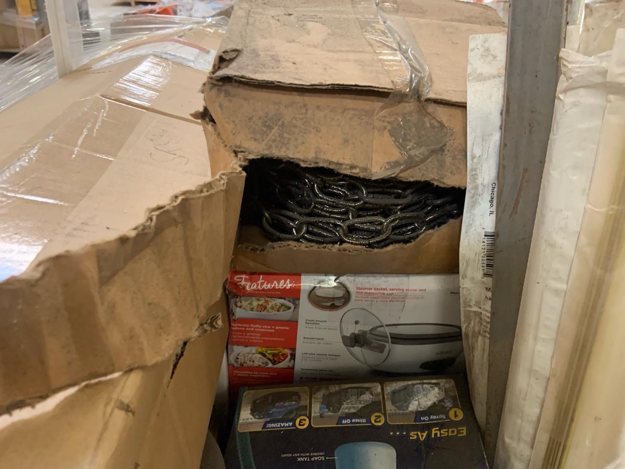 Pallet of mixed merchandise, to include but not limited to: downspout extension, toaster, slow cooke