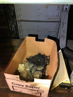 Parts on shelf, box peg hooks. No shelving