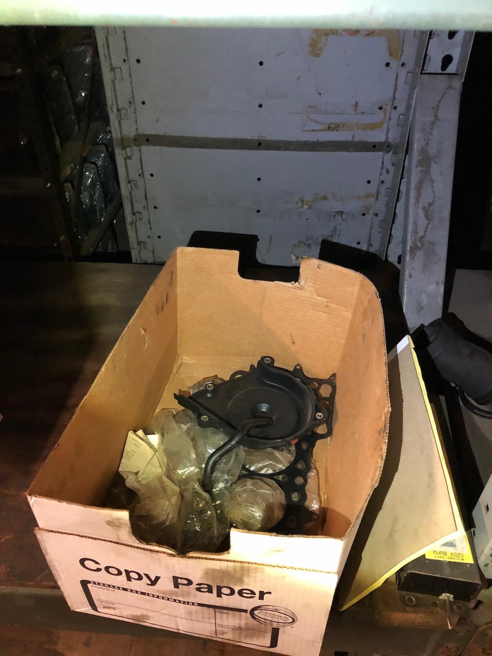 Parts on shelf, box peg hooks. No shelving