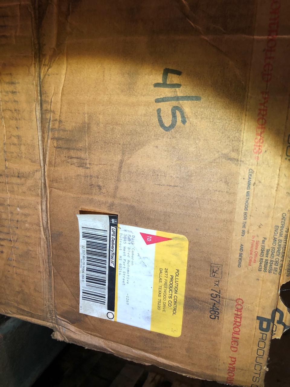 Parts on shelf, box peg hooks. No shelving
