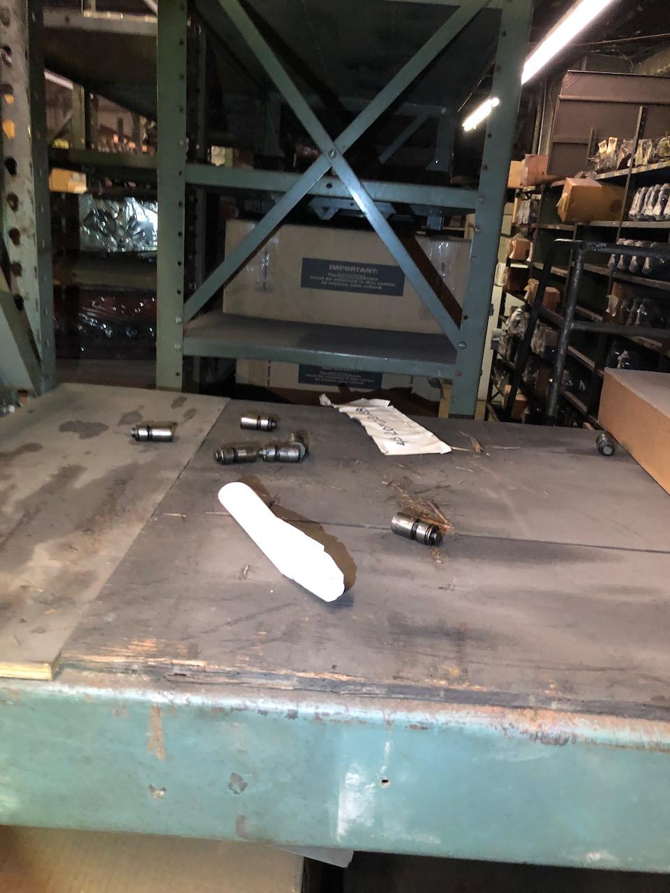 Parts on shelf, box peg hooks. No shelving