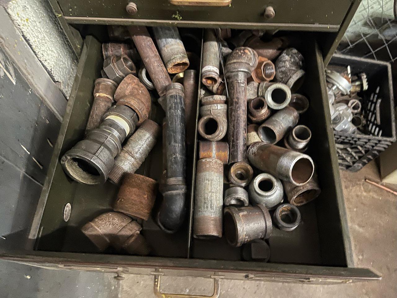 Loc: 3 Maint.  Cabinet with pipe fittings and window and door hardware