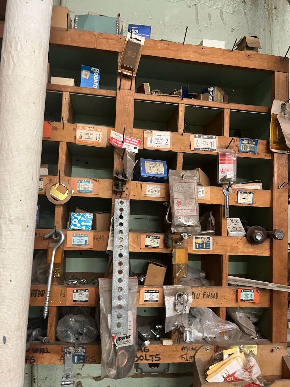 Loc: 3 Maint.  Cabinet with pipe fittings and window and door hardware