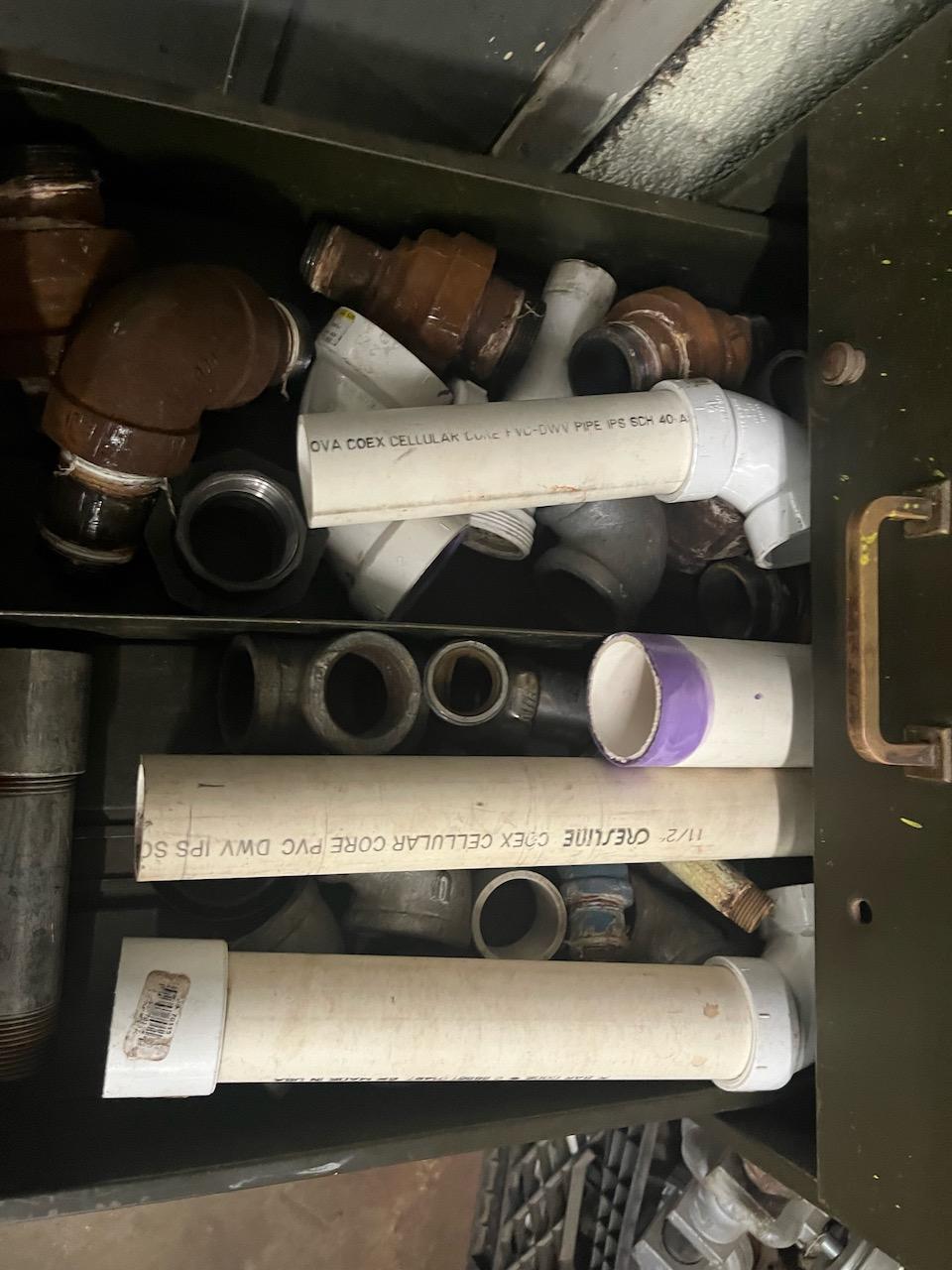 Loc: 3 Maint.  Cabinet with pipe fittings and window and door hardware