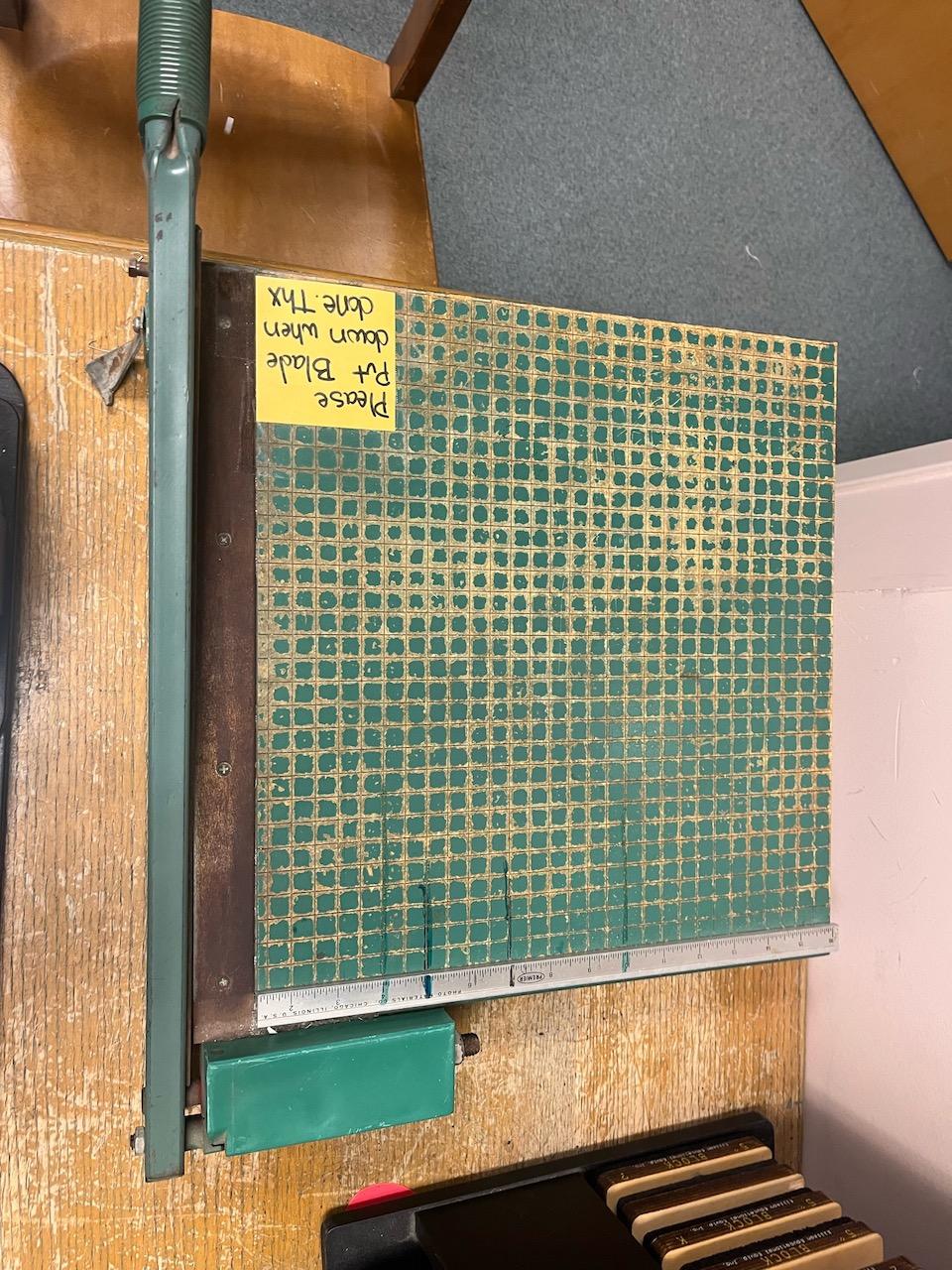 Loc: 5. Original Ellison lettermachine (to include letter blocks, table, chair and paper cutter). Th