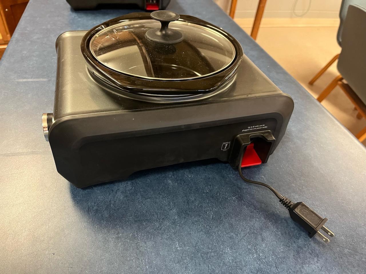 Loc: 6. CrockPot with retractable cord. This lot is located at: 532 Franklin St, Hancock, MI 49930.