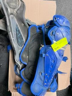 Loc: 2. Lot of 3 Vests, 3 Chest Protectors, and 4 Pairs Knee Pads - Various Sizes. This lot is locat