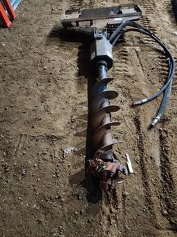 WILLMAR, MN - Skidsteer Attachment with Auger Attached