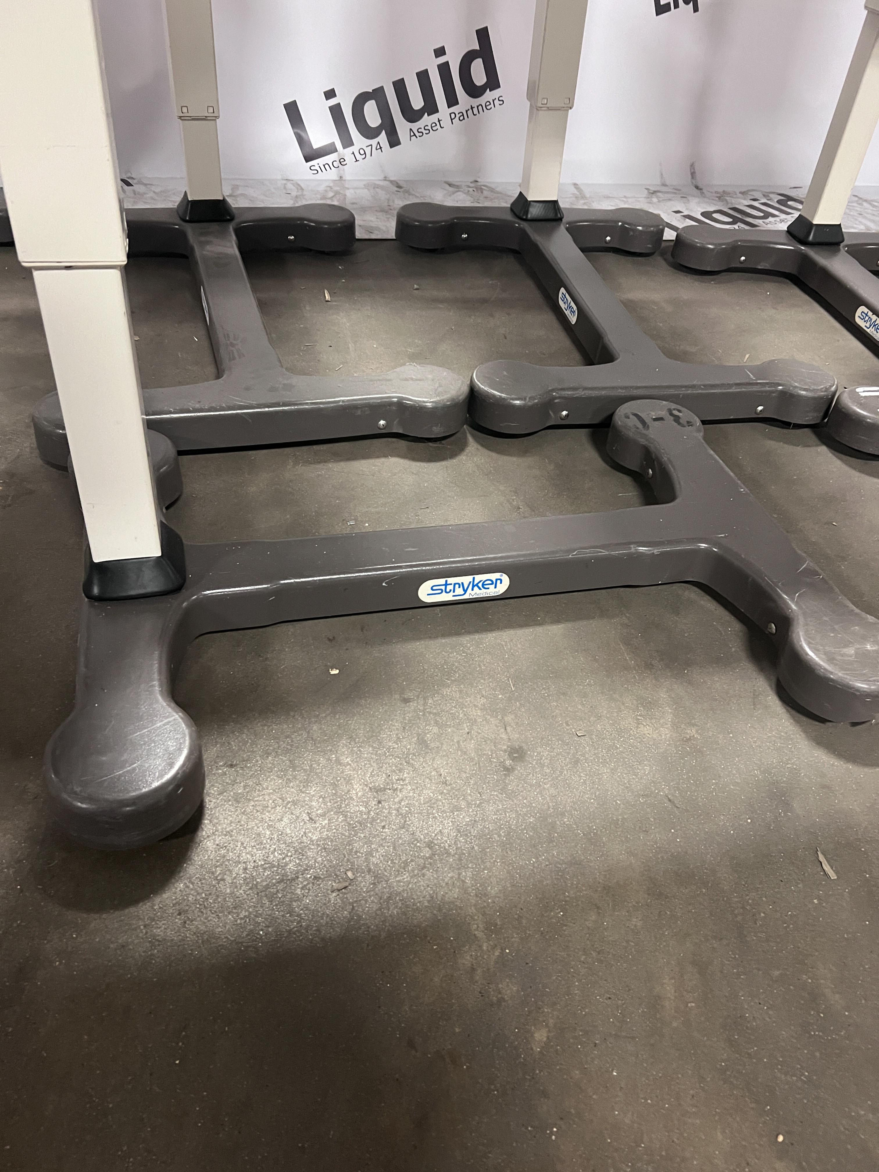 Stryker adjustable overbed tables