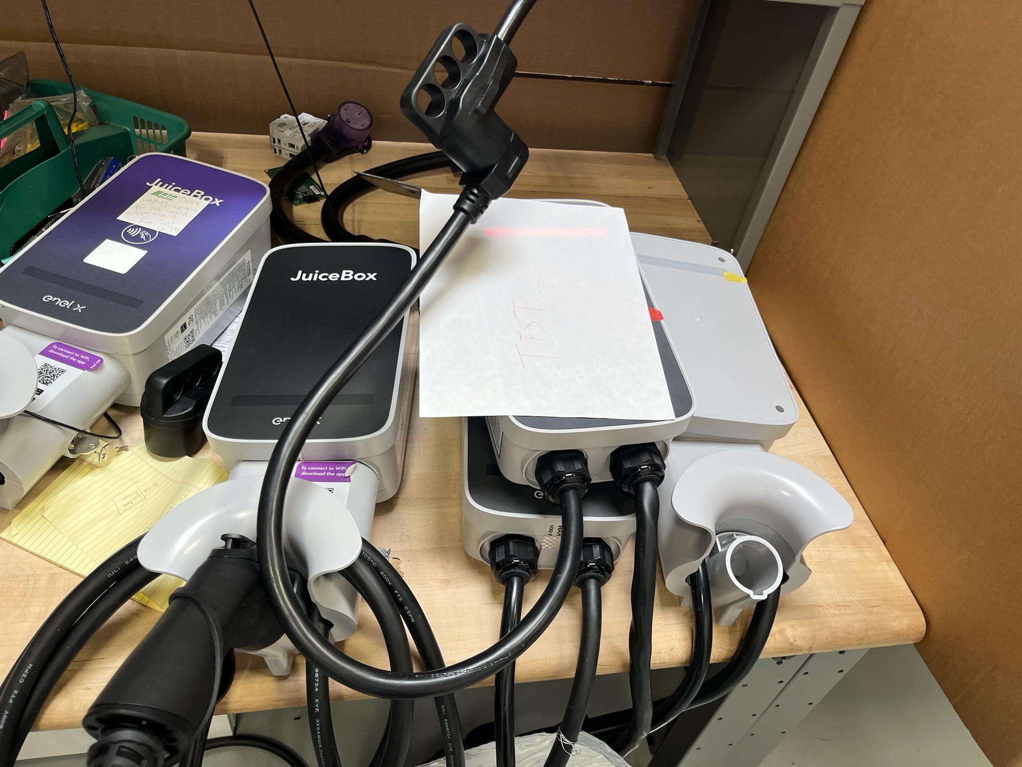Work Table and Pedistal Cabinet with JuiceBox Chargers (Condition unkown) Parts, & Components