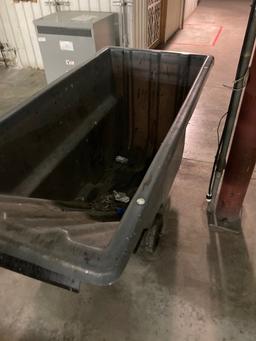 Tilt trash and debris bins