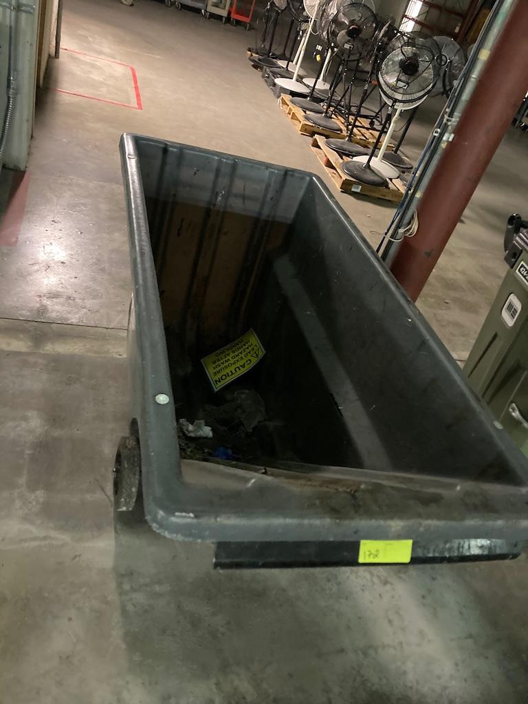 Tilt trash and debris bins