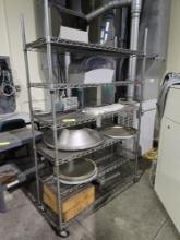 Rolling shelving unit and two metal tables