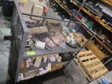Rolling metal shelf with contents