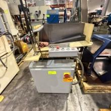 Parts conveyor with hopper