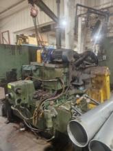 Centerless Rebuilt Grinder by Centerless Rebuilders Inc., includes coolant tank, pump, and overhead