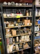 Shelving unit appx. 48"w x 75"h w/ misc. contents - contains filters, etc.
