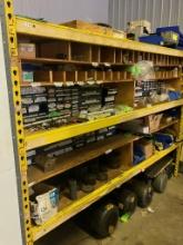 Misc. shelving contents including motors, farrows, fittings, sprockets, bearings, etc.