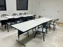 Contents of break room including, tables, chairs, TV, microwaves