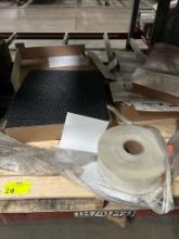 3 boxes of new carpet tiles and 1 roll of tape
