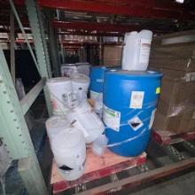 2 empty 50 gallon barrels and 5/1 gallon buckets and jugs