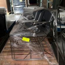 Pallet of 4 stacking chairs