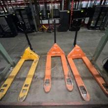 Lot of 3 pallet jacks - 2 Doosan 5500lb capacity & 1 Jungheinrich 5500lb capacity