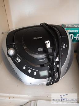 Emerson DVD player with radio and blank CDs