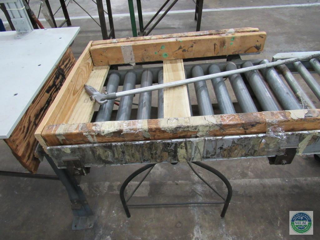 Tagger unit - with dual stitch capability and short roller conveyor section