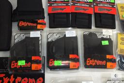 Lot of Bulldog Cases Includes Ankle holster , Belly wrap Holsters, Vism Ballistic Panel.