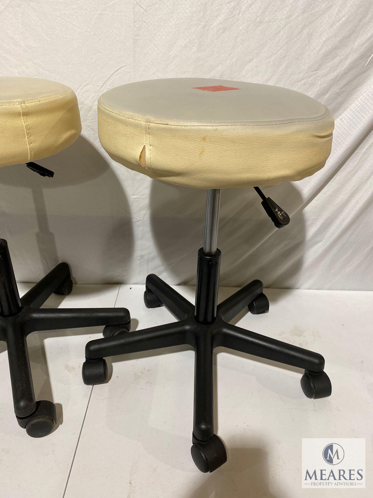 Three Adjustable Cushioned Rolling Stools