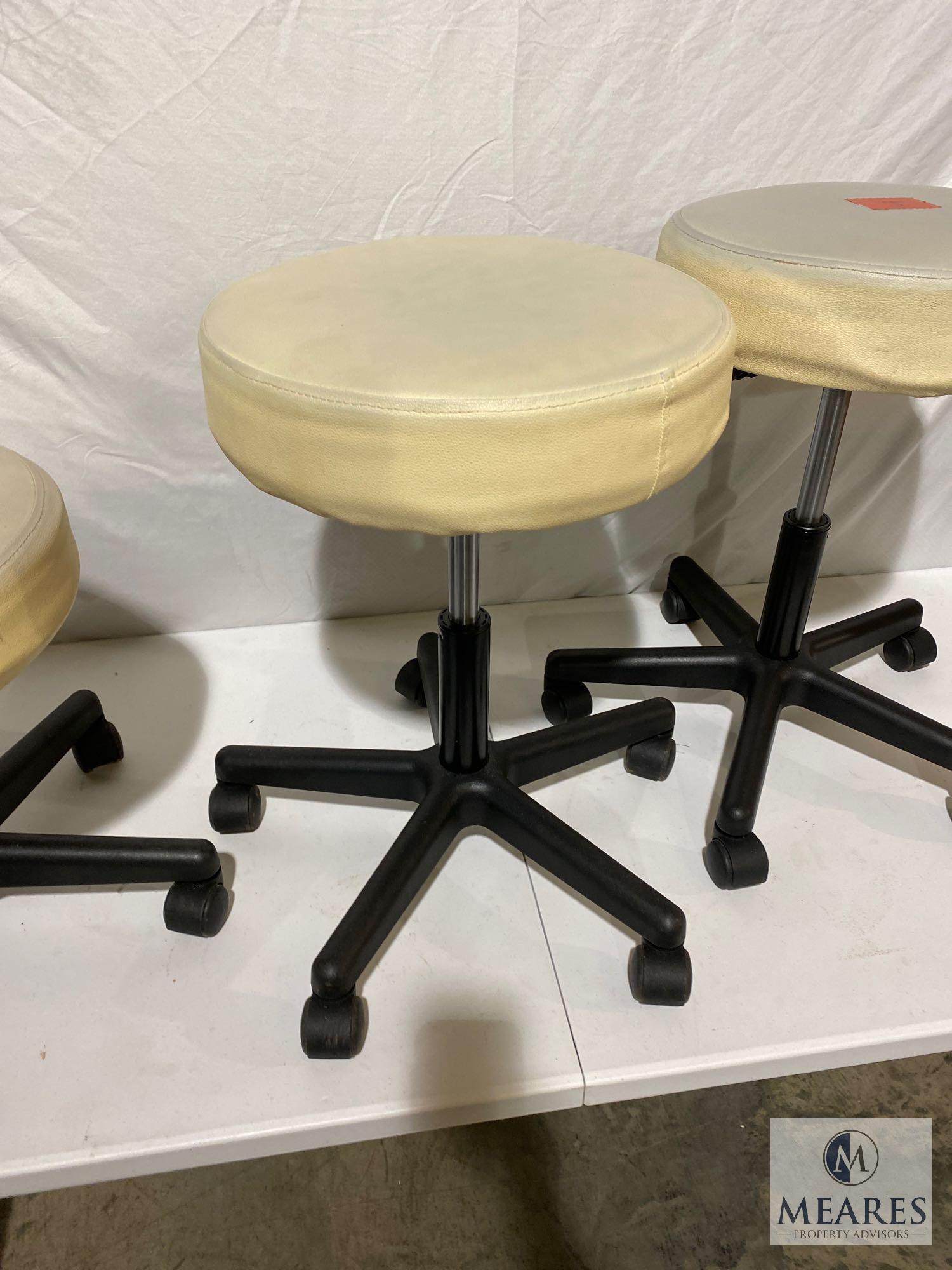 Three Adjustable Cushioned Rolling Stools