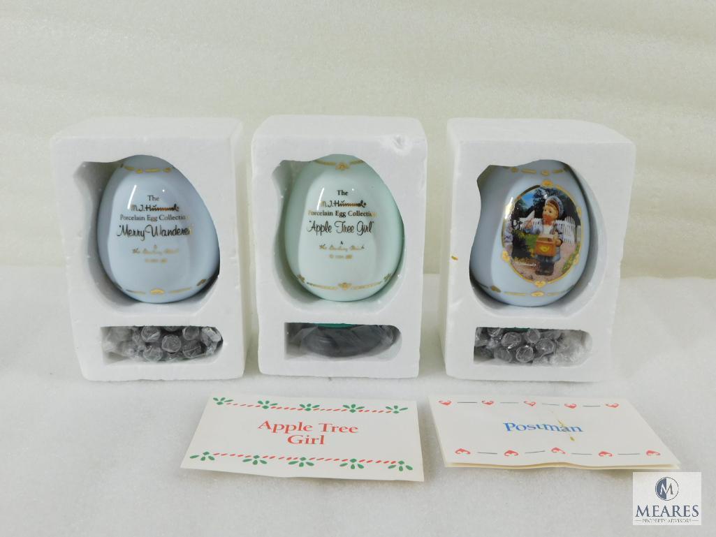 Lot of Three Hummel Collectible Porcelain Eggs: Apple Tree Girl, Postman, Merry Wanderer
