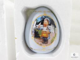 Lot of Three Hummel Collectible Porcelain Eggs: Apple Tree Girl, Postman, Merry Wanderer