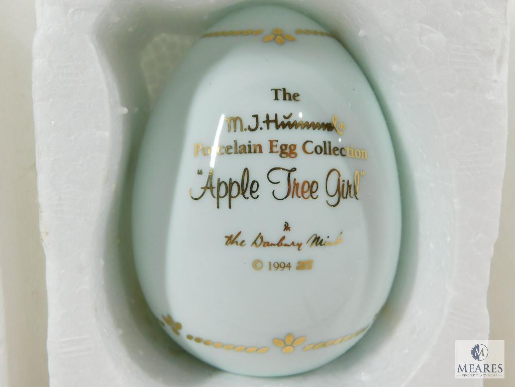 Lot of Three Hummel Collectible Porcelain Eggs: Apple Tree Girl, Postman, Merry Wanderer