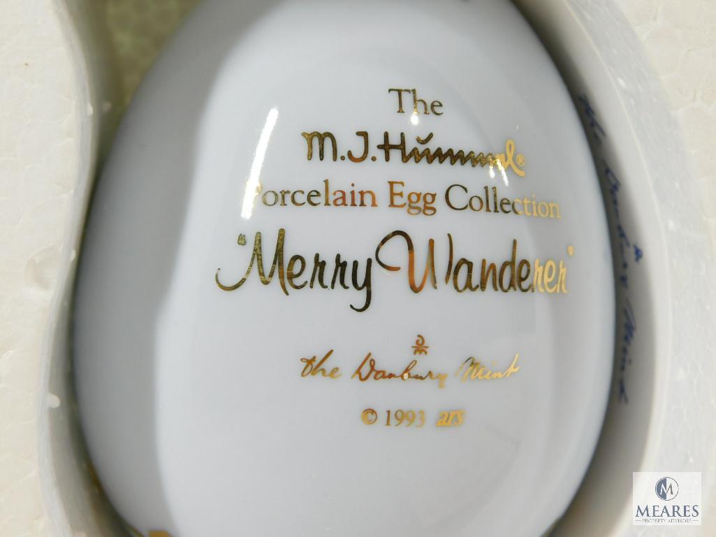 Lot of Three Hummel Collectible Porcelain Eggs: Apple Tree Girl, Postman, Merry Wanderer
