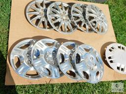 Two Sets of Four Hubcaps Plus One Extra