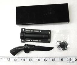 Fixed Blade Knife That Looks Like a Pistol With a Plastic Sheath and Neck Chain