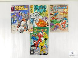 Four Marvel Comic Books Including Two Excalibur, One Transformer, and one Alpha Flight