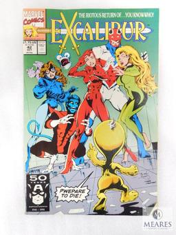 Four Marvel Comic Books Including Two Excalibur, One Transformer, and one Alpha Flight