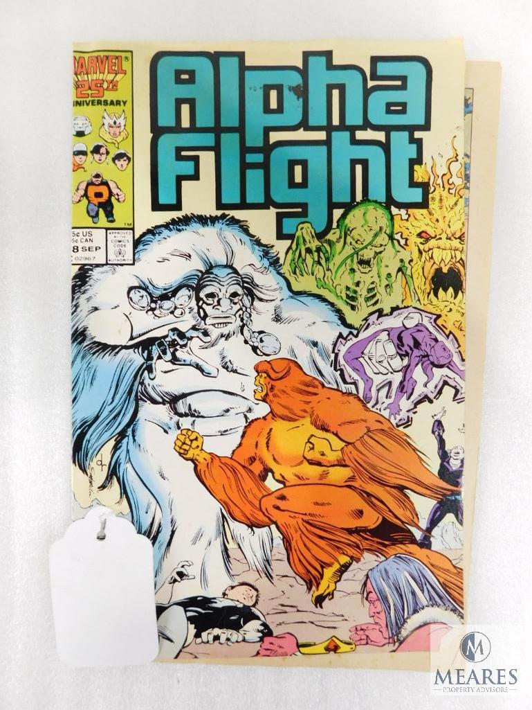 Four Marvel Comic Books Including Two Excalibur, One Transformer, and one Alpha Flight
