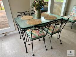 Wrought Iron Table with Glass Top and Four Chairs