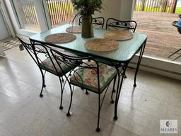 Wrought Iron Table with Glass Top and Four Chairs