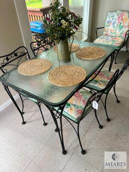 Wrought Iron Table with Glass Top and Four Chairs