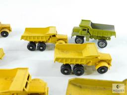 Approximately 14 Miniature Dump Trucks