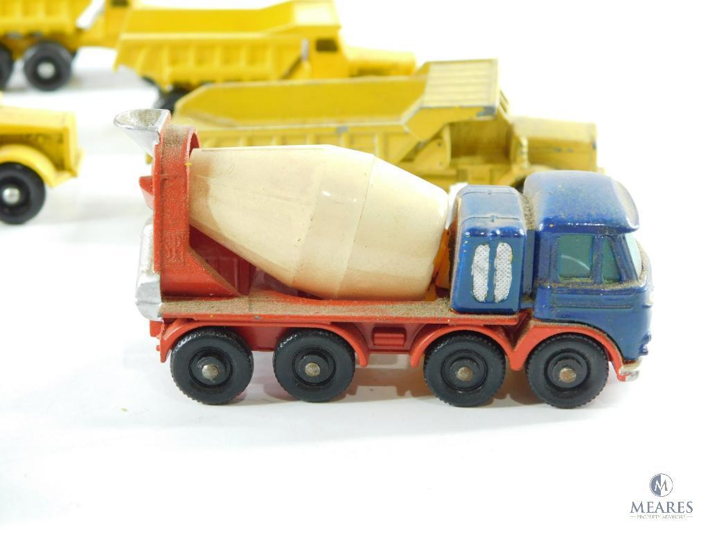 Approximately 14 Miniature Dump Trucks