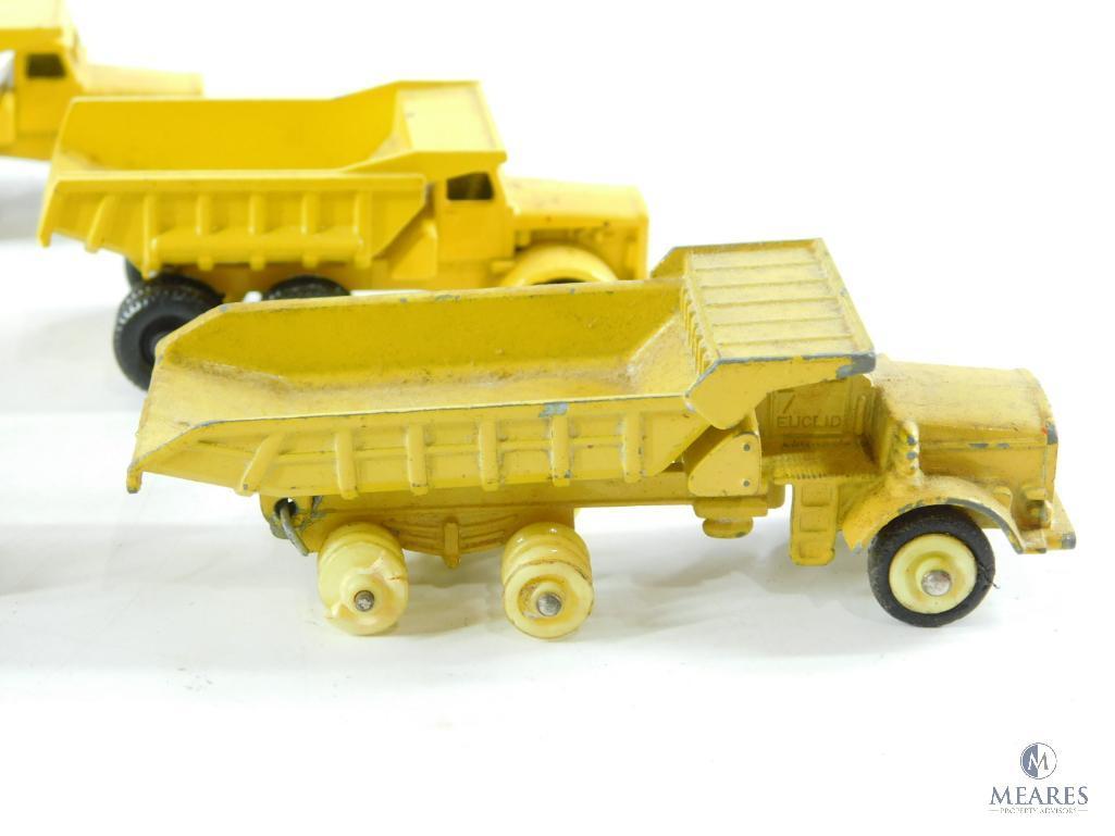 Approximately 14 Miniature Dump Trucks