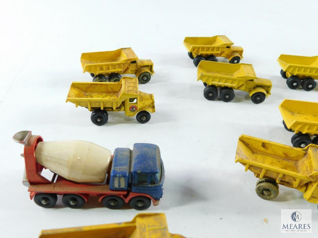 Approximately 14 Miniature Dump Trucks