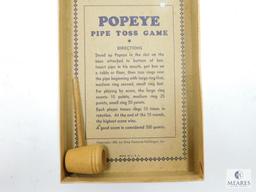 Popeye Pipe Toss Game - King Features Syndicate